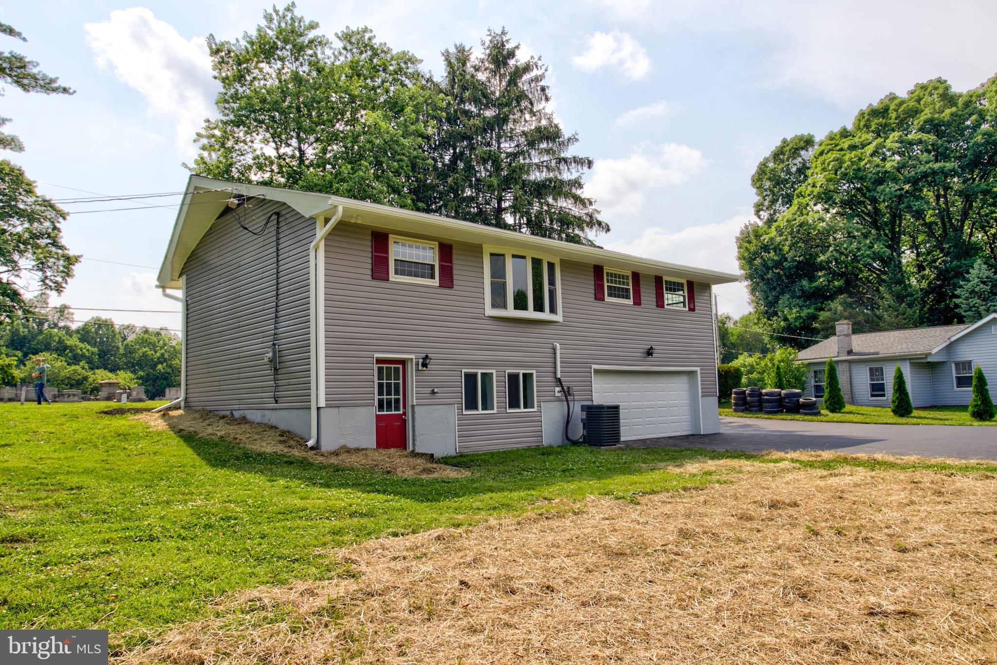 1229 Rawlinsville Road New Providence, PA 17560 - Photo 8 of 29 a view of a house with a yard and sitting area