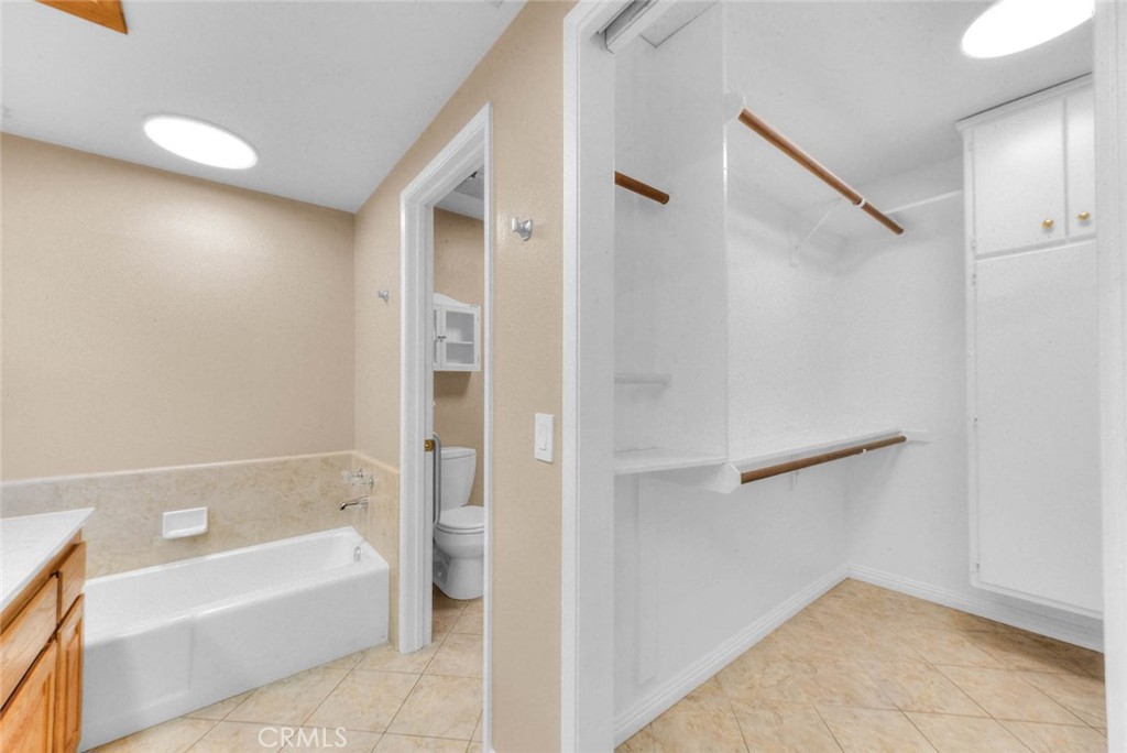 30673 Del Rey Road Temecula, CA 92591 - Photo 30 of 47 Upon Entry Spacious Walk In Closet To Right Next Tub Next Walk In Shower And Toilet. New Overhead LED Lighting.