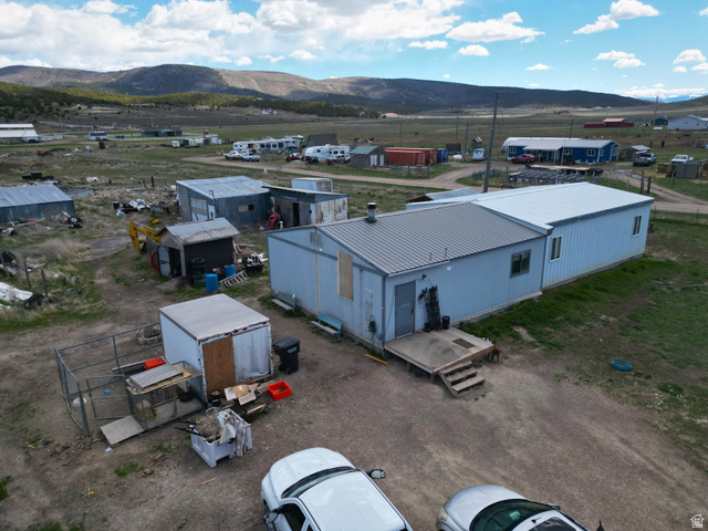 34030 North 7905th East Fairview, UT 84629 - Photo 4 of 30 Drone / aerial view of a mountain backdrop