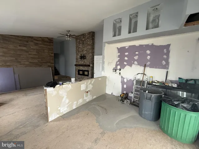 a bathroom with a shower and closet