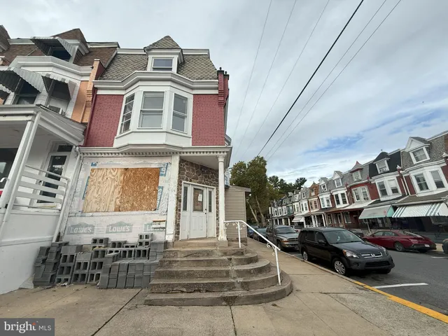 a view of a street with cars