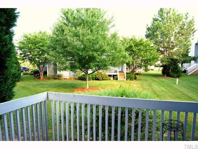 8320 Hempshire Place, Unit 101 Raleigh, NC 27613 - Photo 12 of 12 a view of an outdoor space with a lake view
