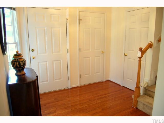 8320 Hempshire Place, Unit 101 Raleigh, NC 27613 - Photo 6 of 12 a view of a bathroom with a shower curtain