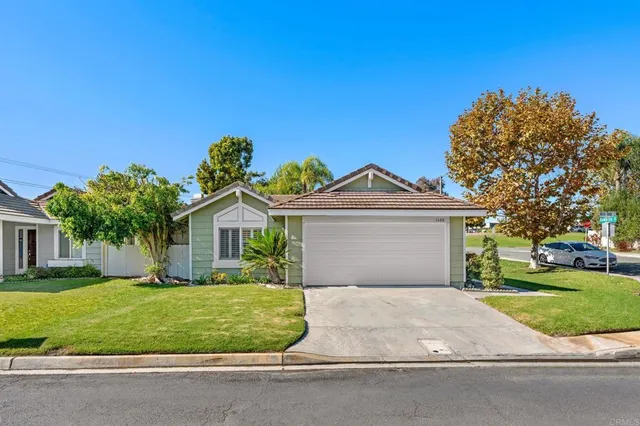 front view of house with a yard