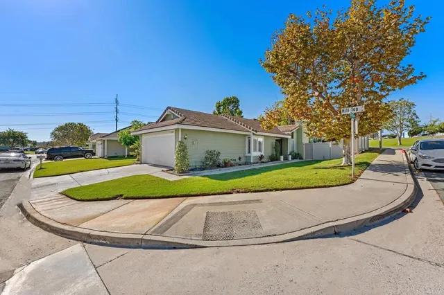 a view of a house with a big yard