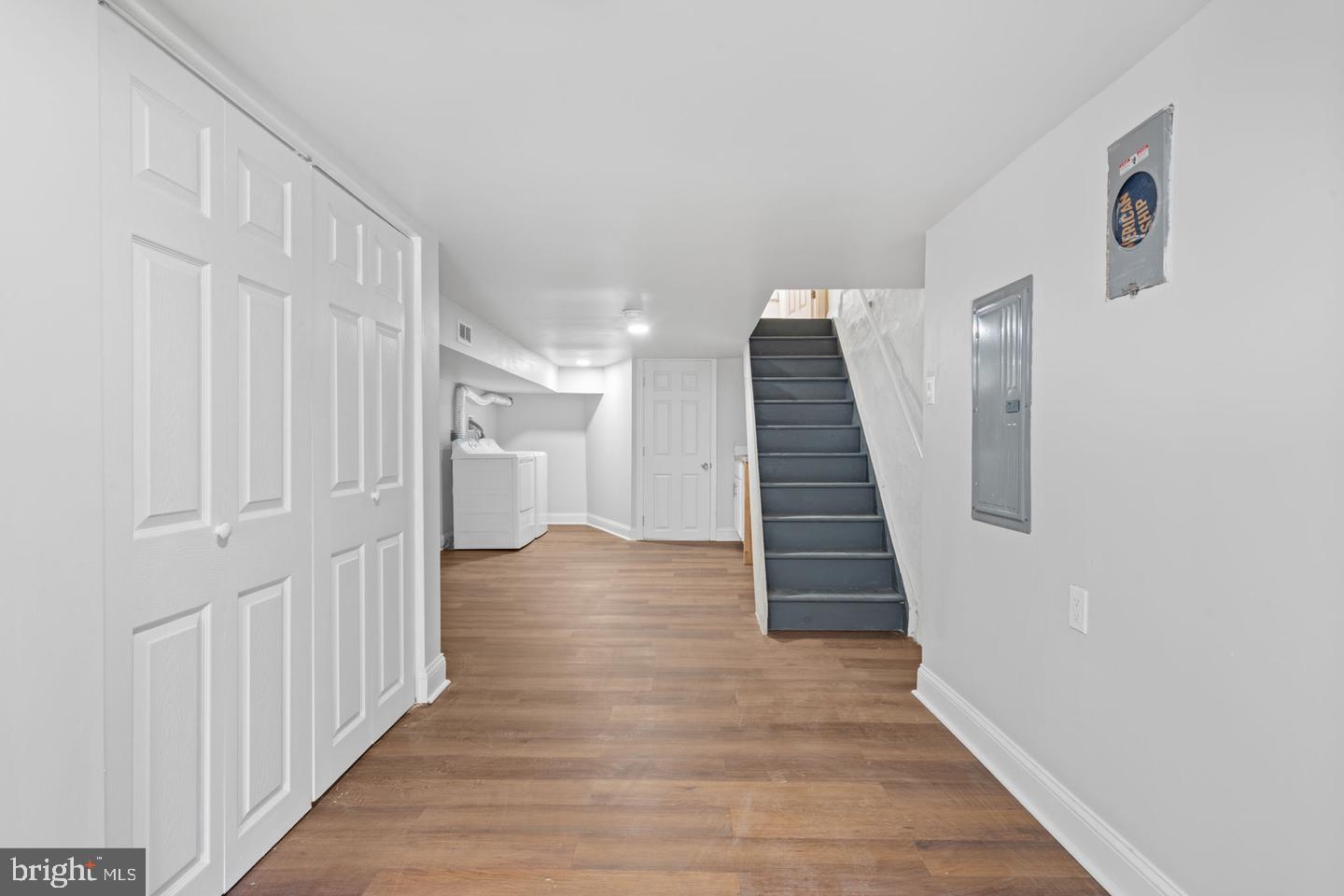 4847 Fairmount Avenue Philadelphia, PA 19139 - Photo 14 of 35 a view of a hallway with wooden floor and stairs