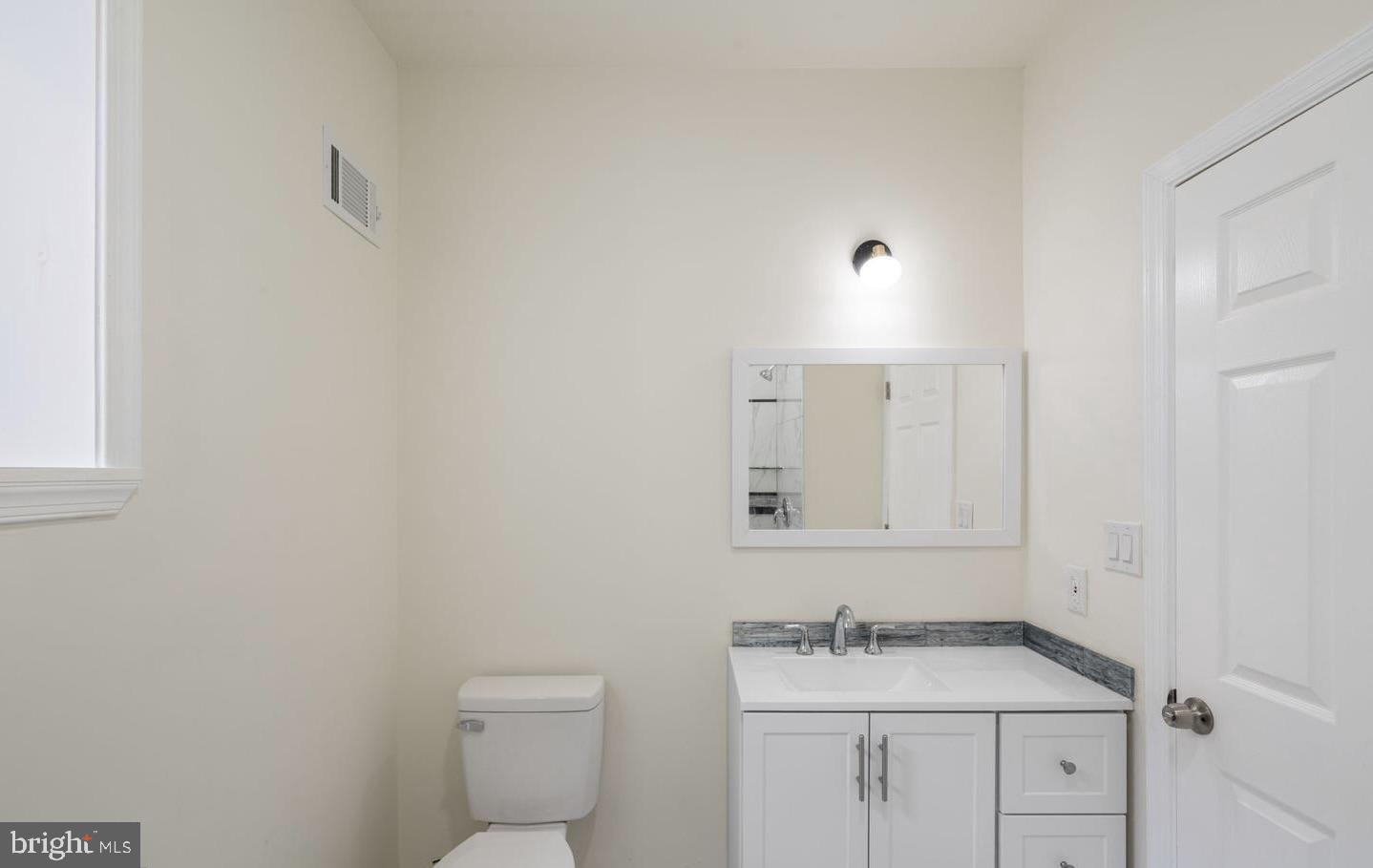 4847 Fairmount Avenue Philadelphia, PA 19139 - Photo 15 of 35 a bathroom with a sink toilet and a mirror