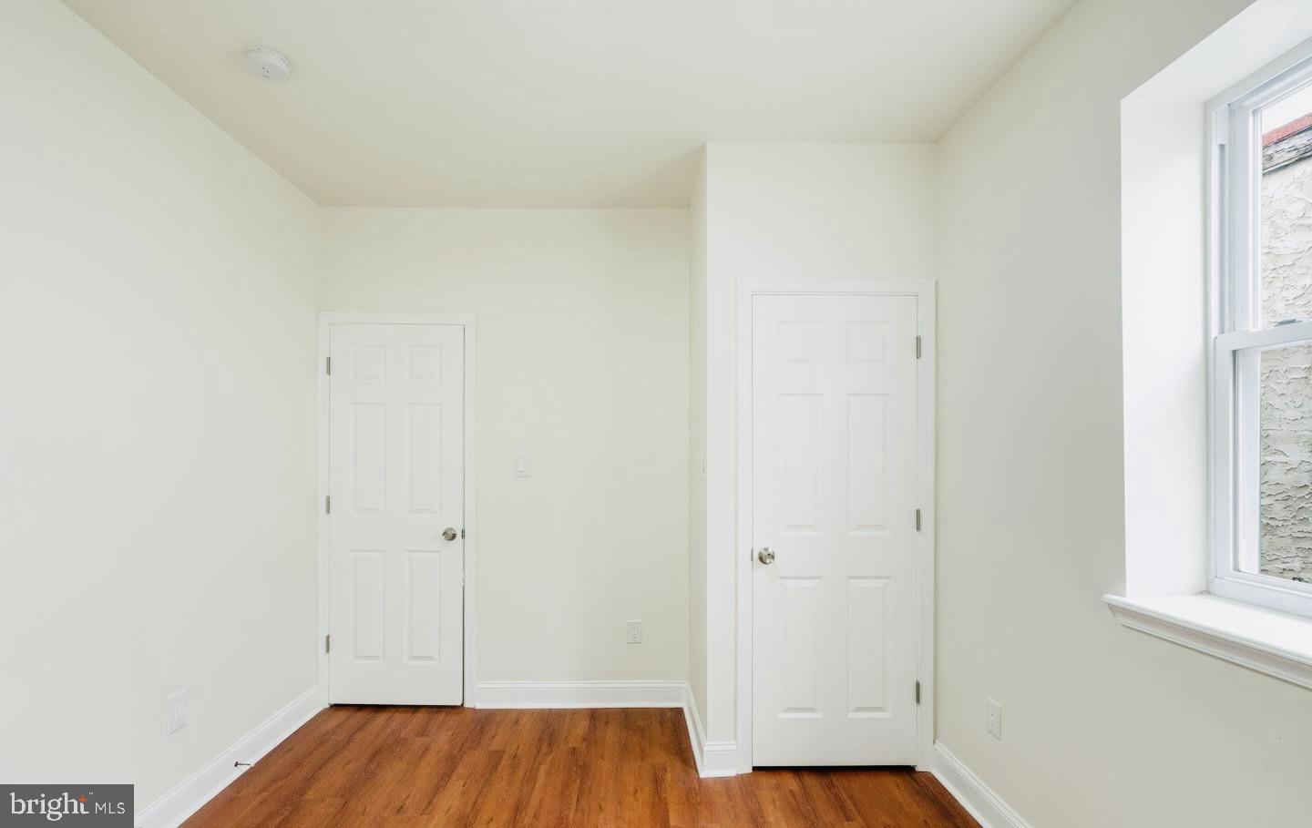 4847 Fairmount Avenue Philadelphia, PA 19139 - Photo 18 of 35 a view of bathroom with window and wooden floor