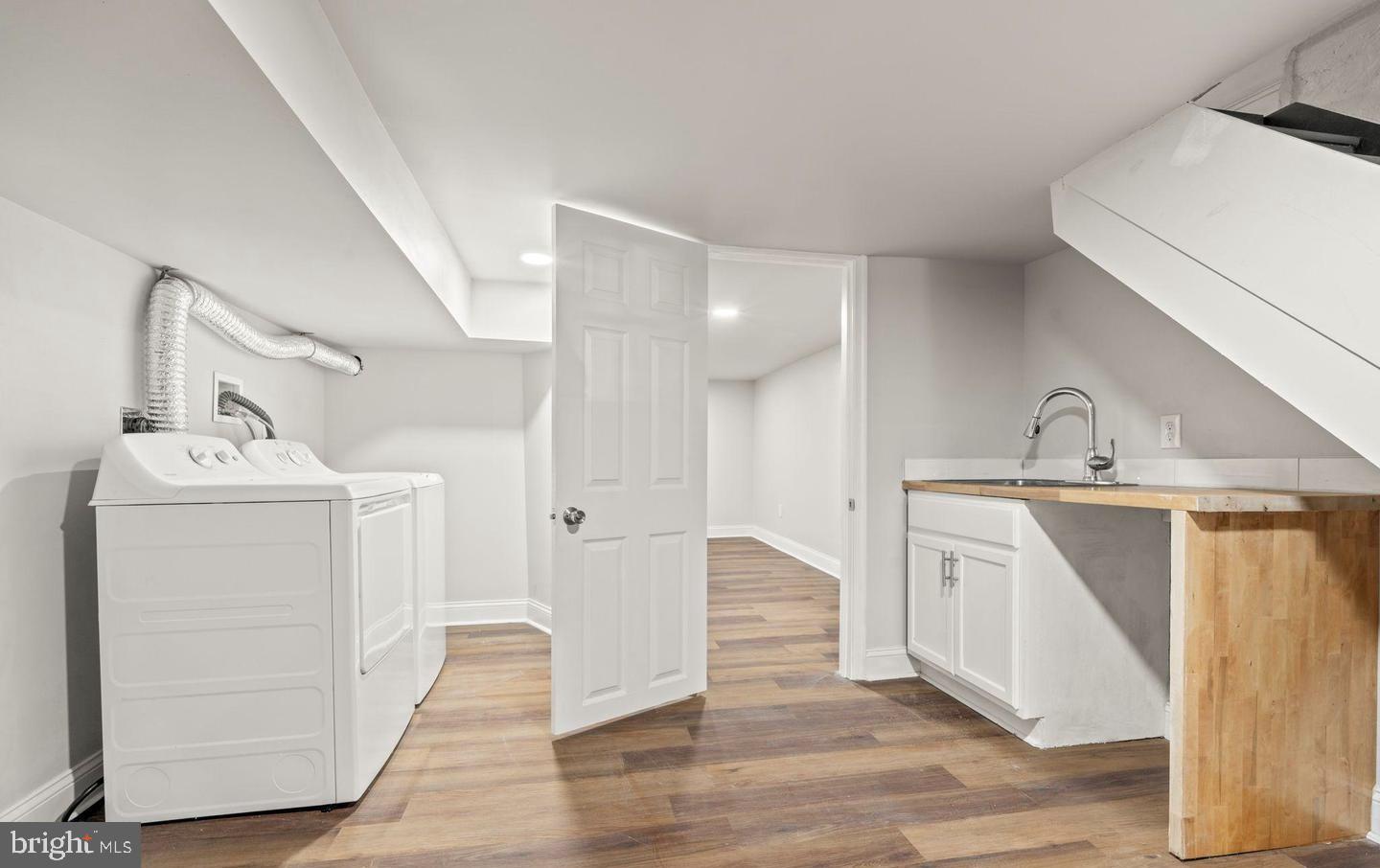 4847 Fairmount Avenue Philadelphia, PA 19139 - Photo 29 of 35 a utility room with cabinets washer and dryer