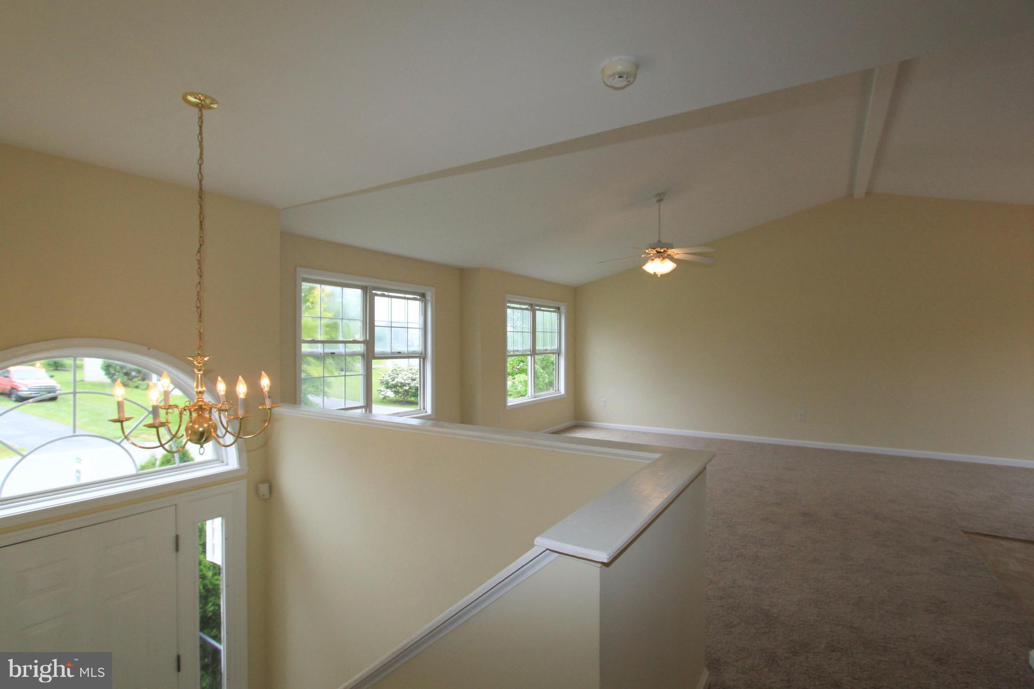 21 Cotton Tail Drive Ranson, WV 25438 - Photo 2 of 15 Sunny split foyer lets in lots of light.