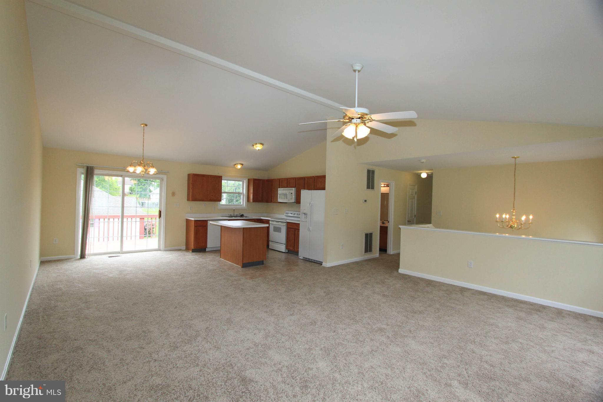 21 Cotton Tail Drive Ranson, WV 25438 - Photo 6 of 15 and has access to deck that leads to fenced yard.