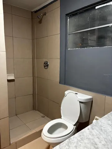 a view of a kitchen from the hallway