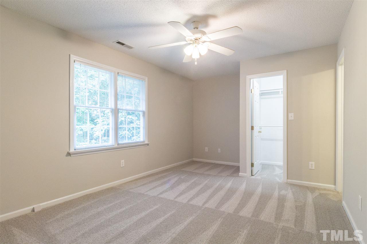 4451 Antique Lane Raleigh, NC 27616 - Photo 16 of 24 a view of an empty room with a window