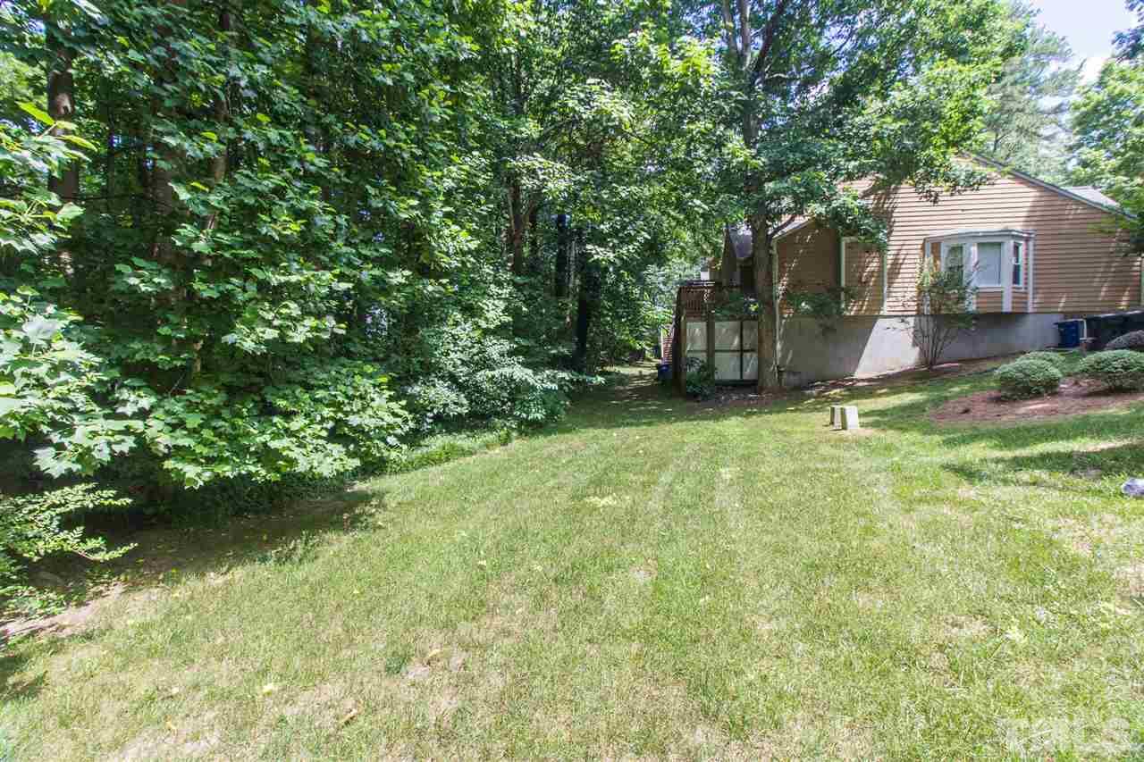 4451 Antique Lane Raleigh, NC 27616 - Photo 23 of 24 a view of a house with a yard and a tree