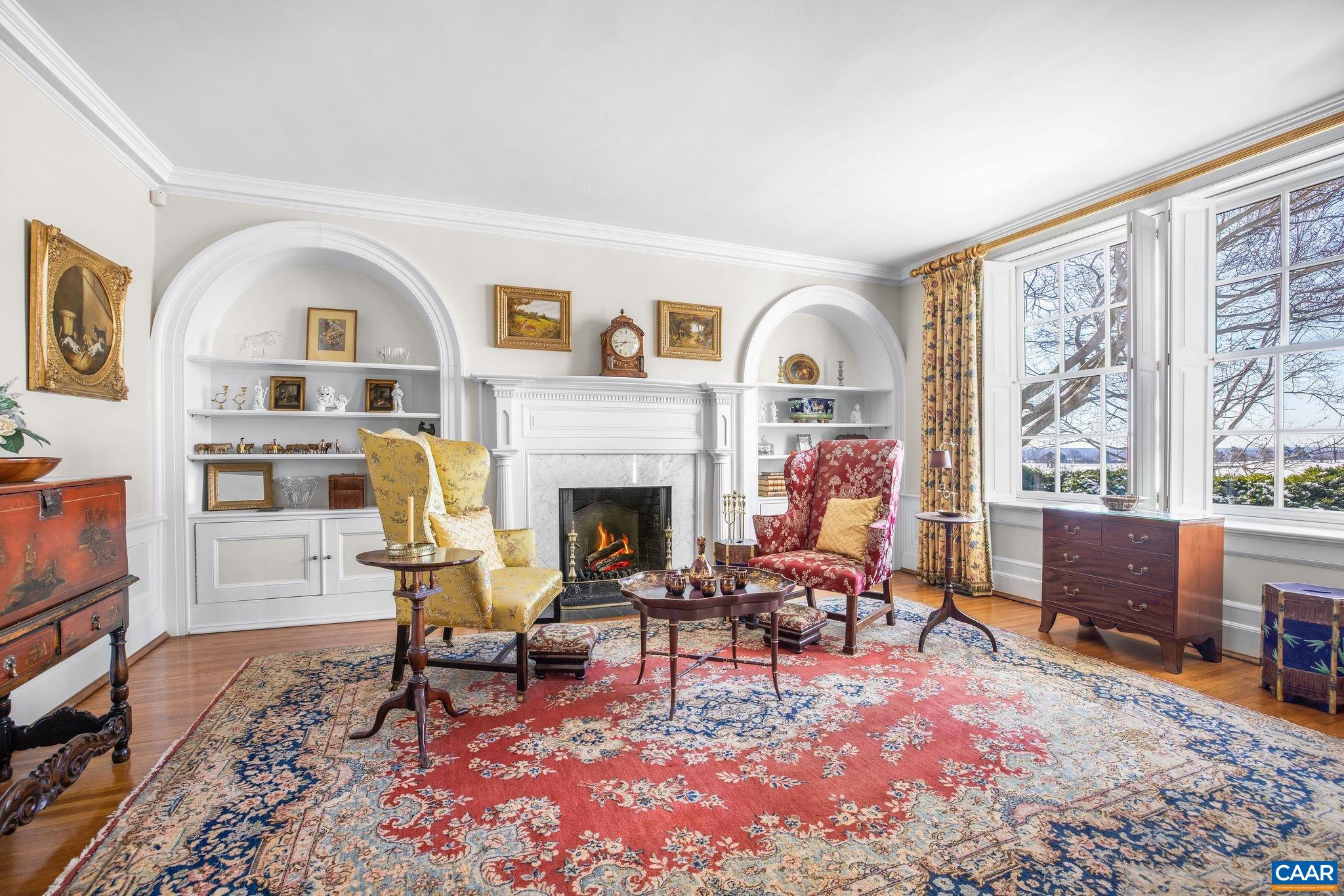 2328 Liberty Corner Road Esmont, VA 22937 - Photo 11 of 75 a living room with furniture a rug and a fireplace