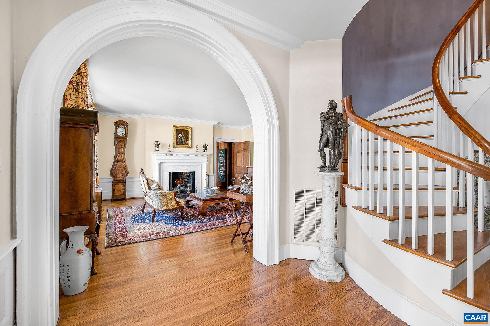 2328 Liberty Corner Road Esmont, VA 22937 - Photo 12 of 75 a view of a livingroom with wooden floor and a fireplace