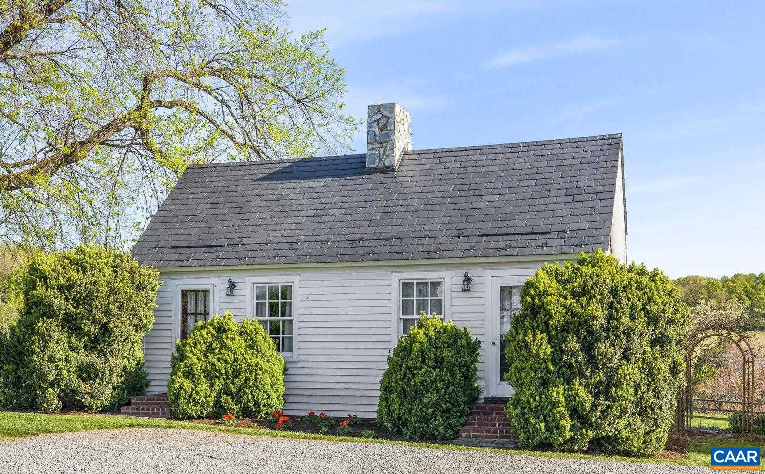 2328 Liberty Corner Road Esmont, VA 22937 - Photo 35 of 75 a front view of a house with garden
