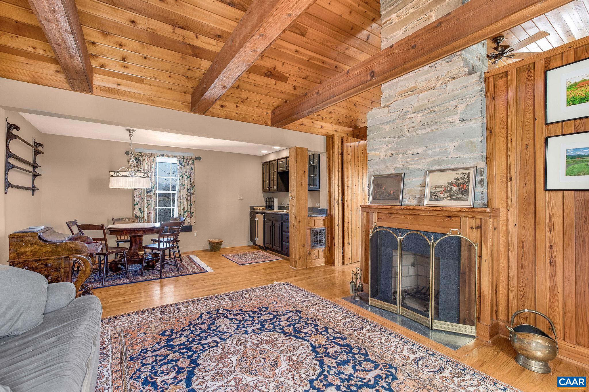 2328 Liberty Corner Road Esmont, VA 22937 - Photo 36 of 75 a living room with furniture and a fireplace