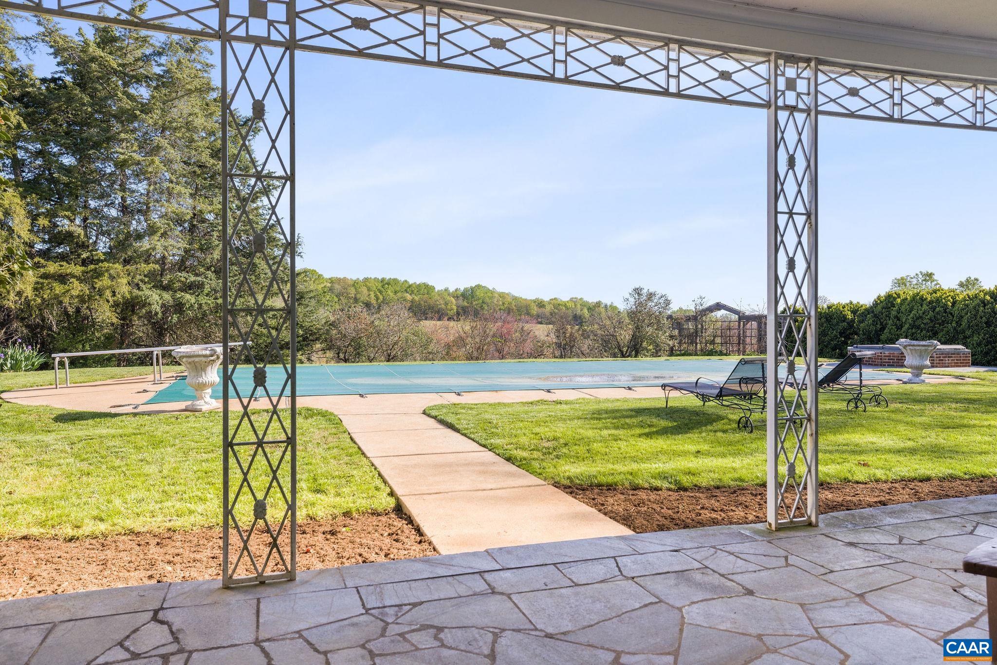 2328 Liberty Corner Road Esmont, VA 22937 - Photo 37 of 75 a view of a swimming pool with a lounge chairs