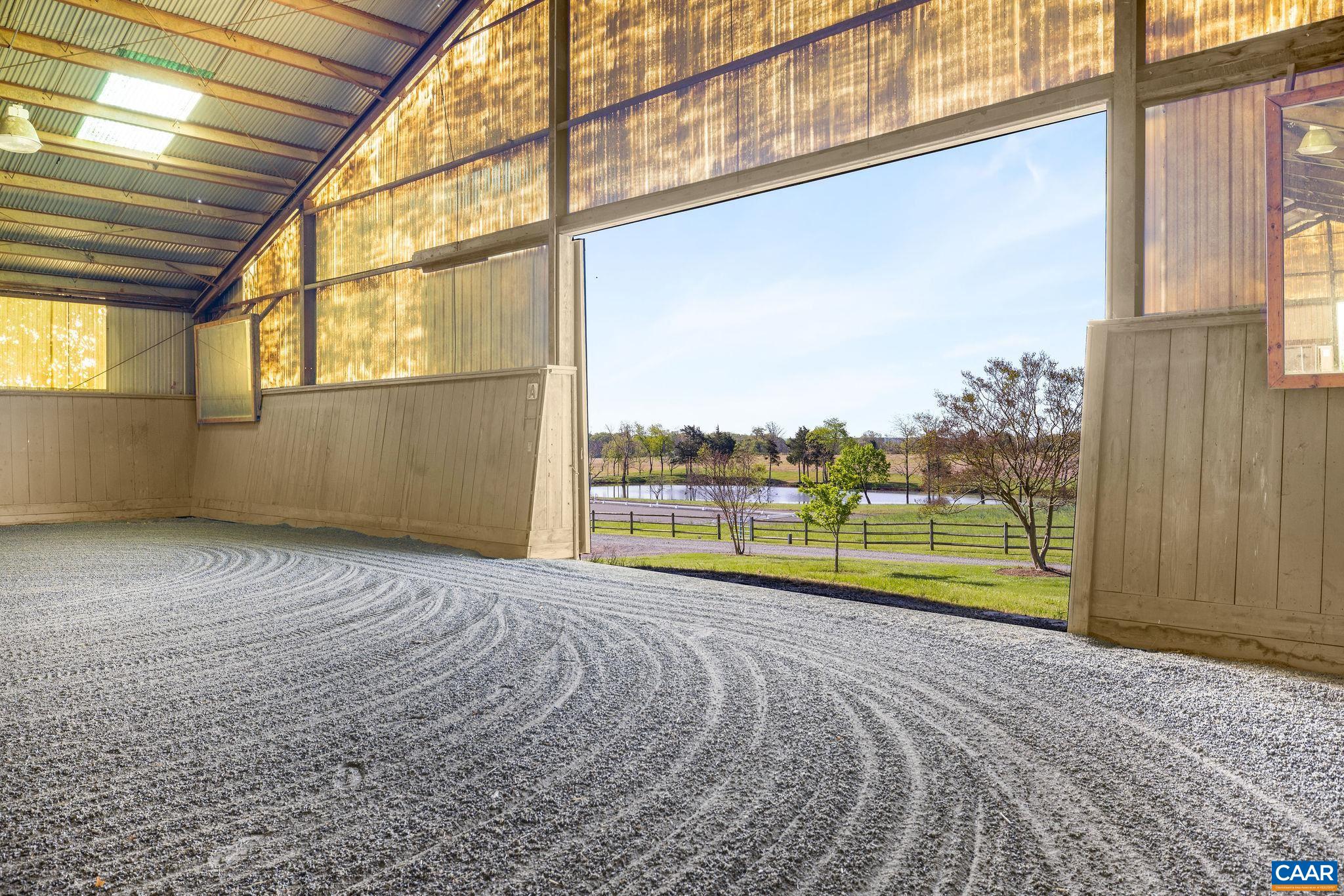 2328 Liberty Corner Road Esmont, VA 22937 - Photo 52 of 75 a view of an empty room with a floor to ceiling window and a room