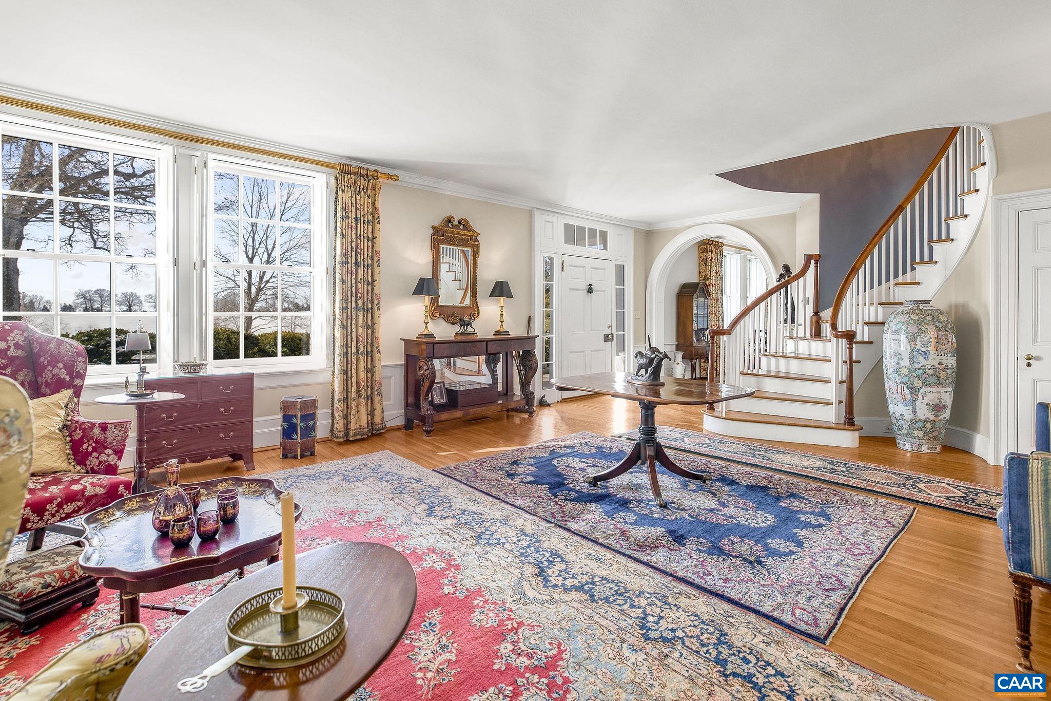 2328 Liberty Corner Road Esmont, VA 22937 - Photo 10 of 75 a living room filled with furniture and a rug