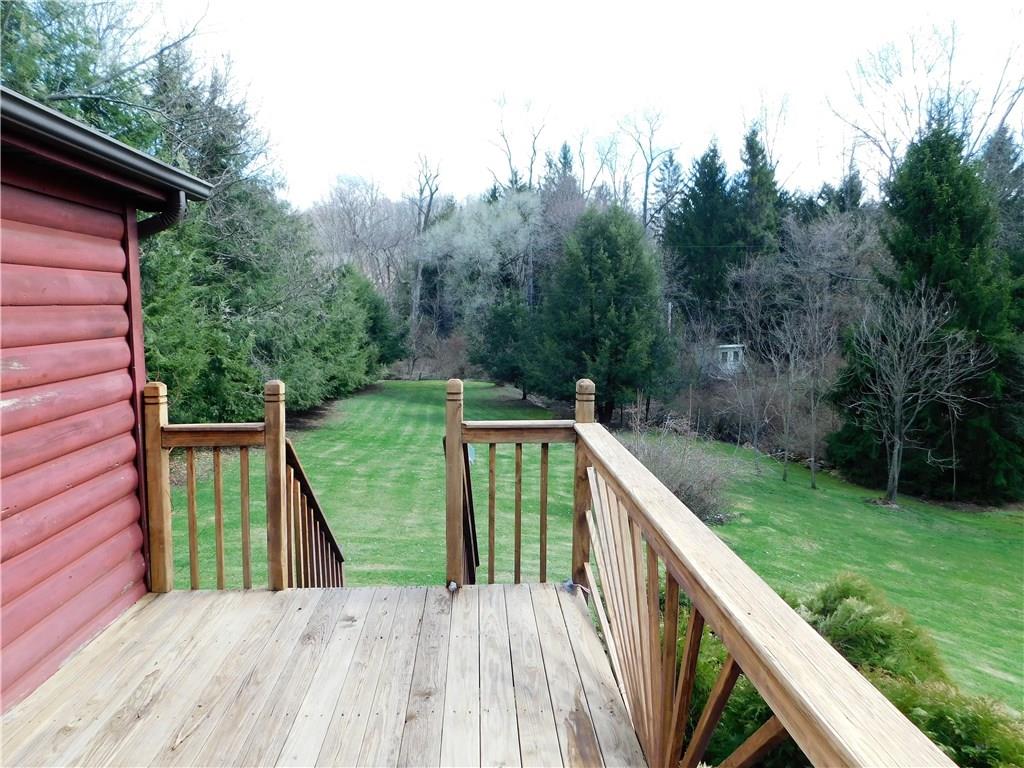 120 Freeman Road Irwin, PA 15642 - Photo 2 of 17 Sit on the huge deck and enjoy the sounds of nature.