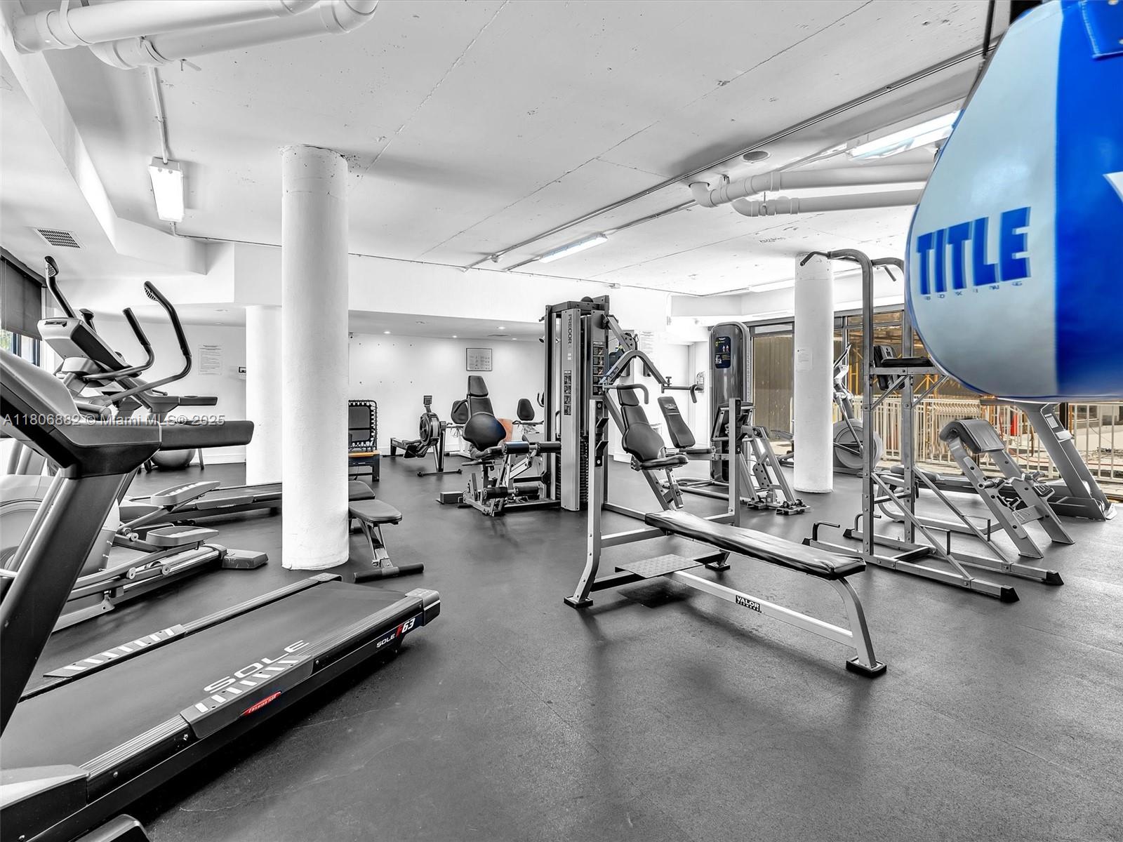 6423 Collins Avenue, Unit 409 Miami Beach, FL 33141 - Photo 48 of 66 a view of a room with gym equipment