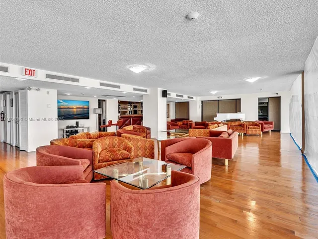 a view of a lake with tall buildings