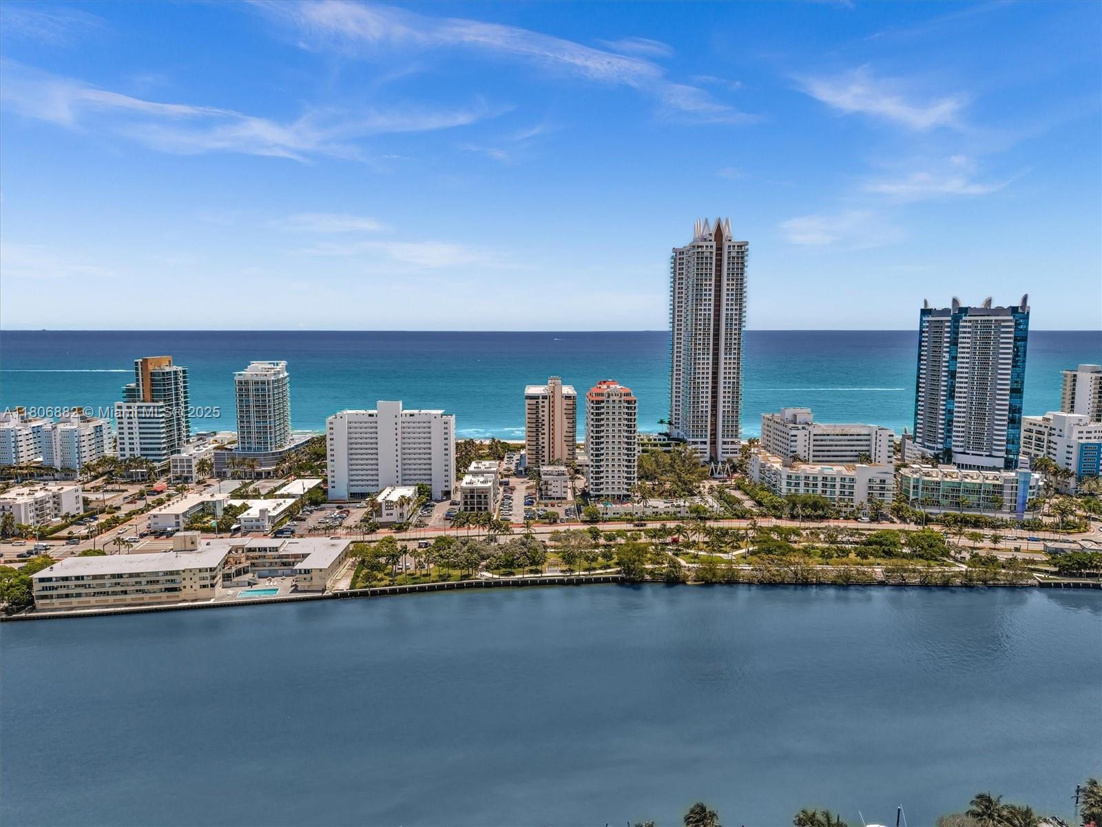 6423 Collins Avenue, Unit 409 Miami Beach, FL 33141 - Photo 6 of 66 a view of a lake with tall buildings
