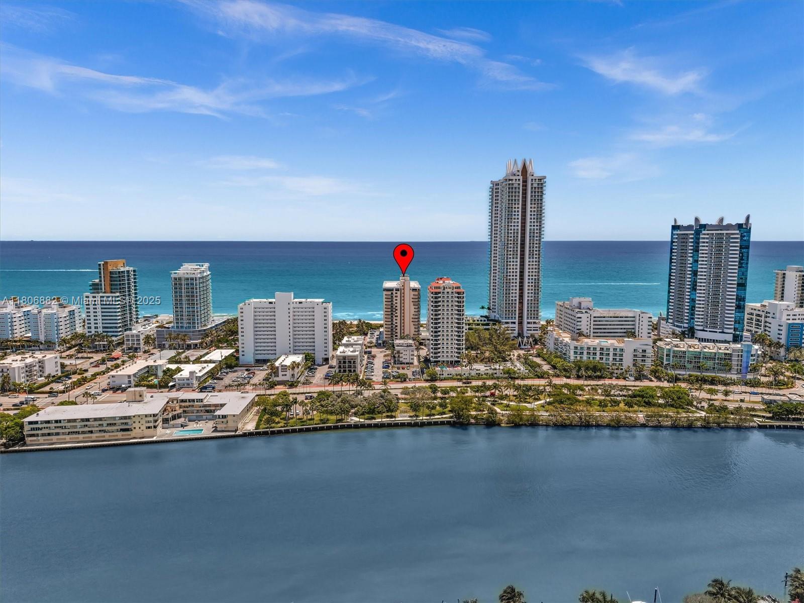 6423 Collins Avenue, Unit 409 Miami Beach, FL 33141 - Photo 66 of 66 a view of a lake with tall buildings