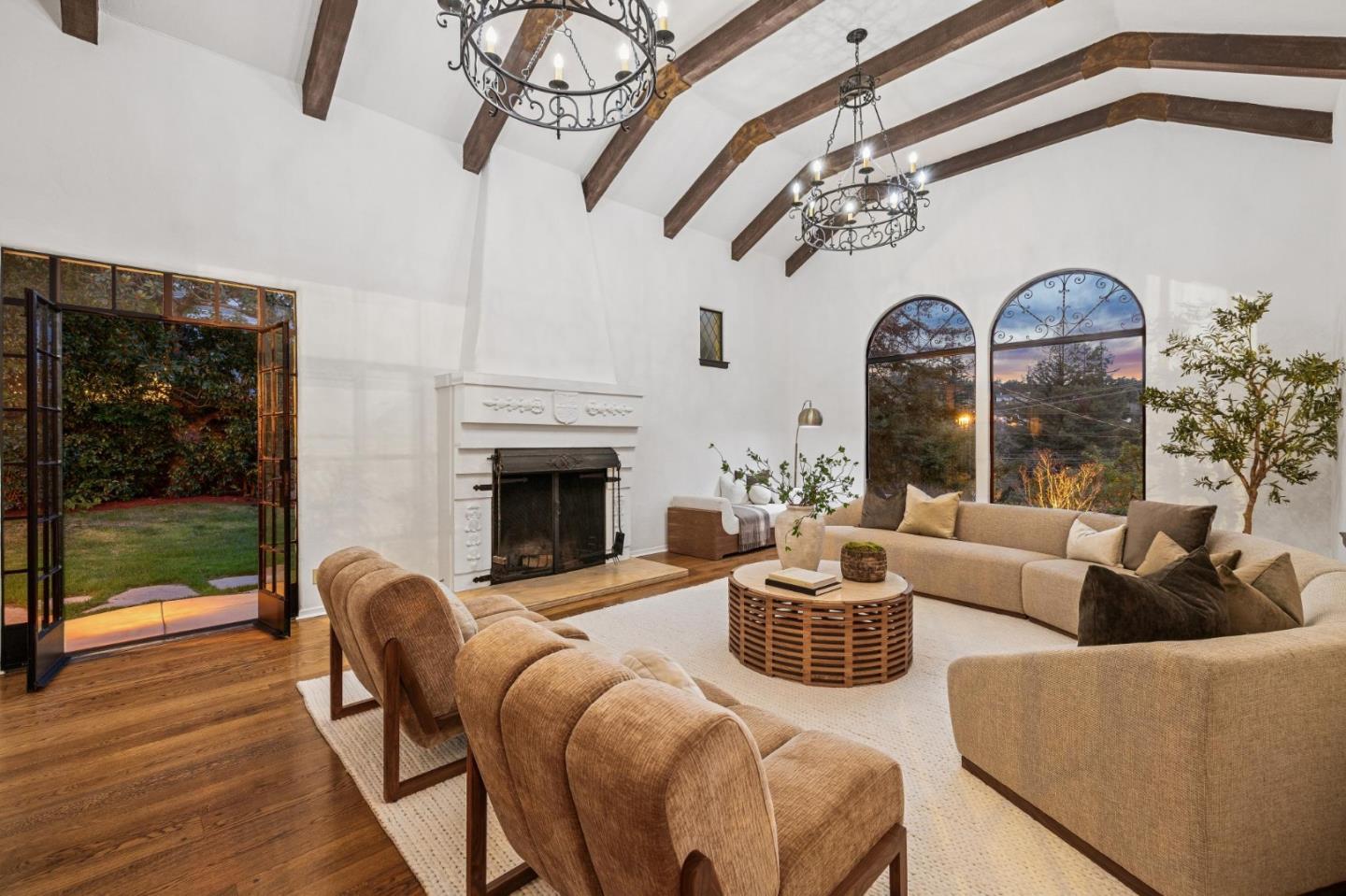 414 Edgewood Road San Mateo, CA 94402 - Photo 109 of 112 a living room with furniture a chandelier and a floor to ceiling window