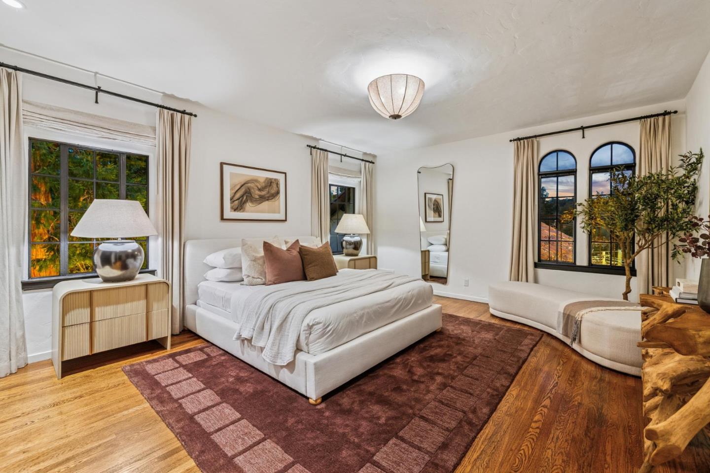414 Edgewood Road San Mateo, CA 94402 - Photo 112 of 112 a spacious bedroom with a large bed and a chandelier