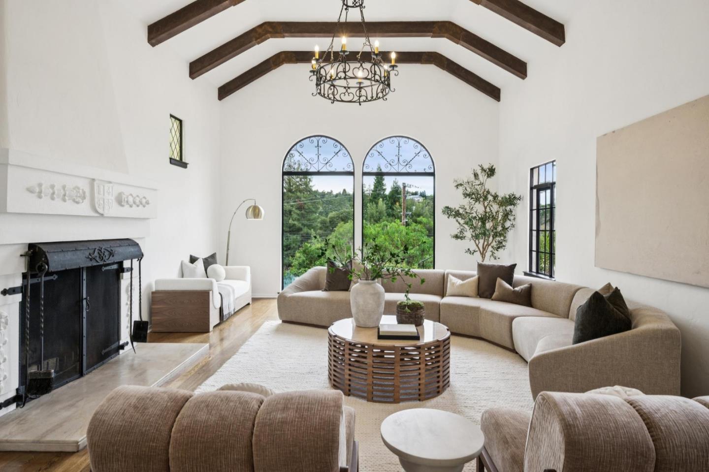 414 Edgewood Road San Mateo, CA 94402 - Photo 19 of 112 a living room with furniture a fireplace and a chandelier
