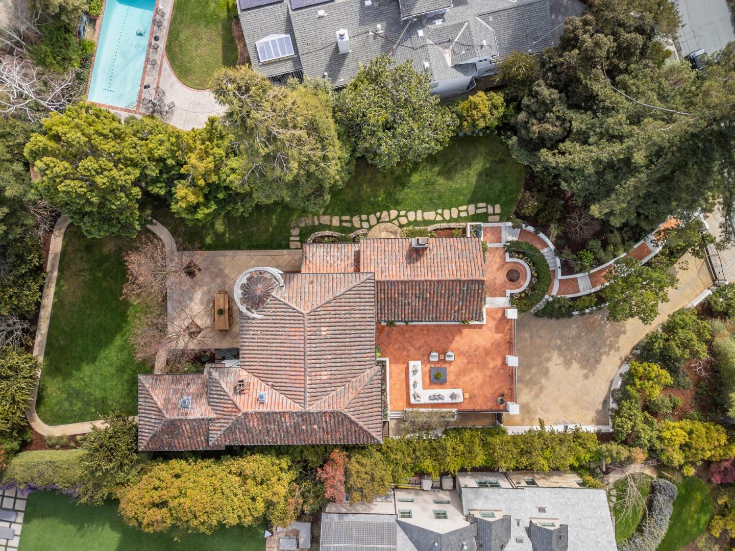 414 Edgewood Road San Mateo, CA 94402 - Photo 3 of 112 an aerial view of a house with a yard and lake view