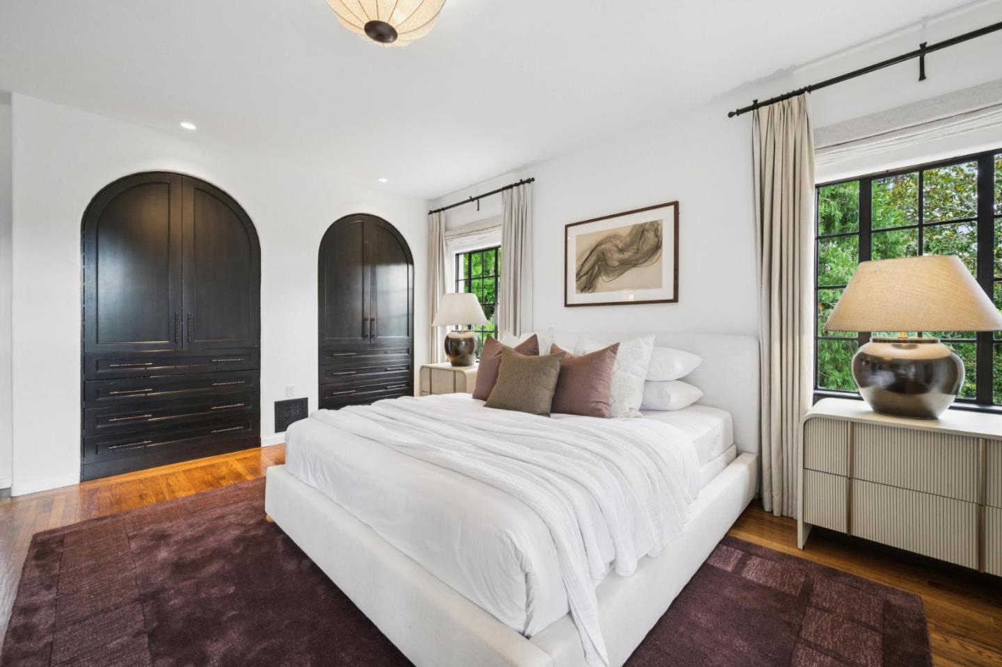 414 Edgewood Road San Mateo, CA 94402 - Photo 47 of 112 a bedroom with a bed and a large window