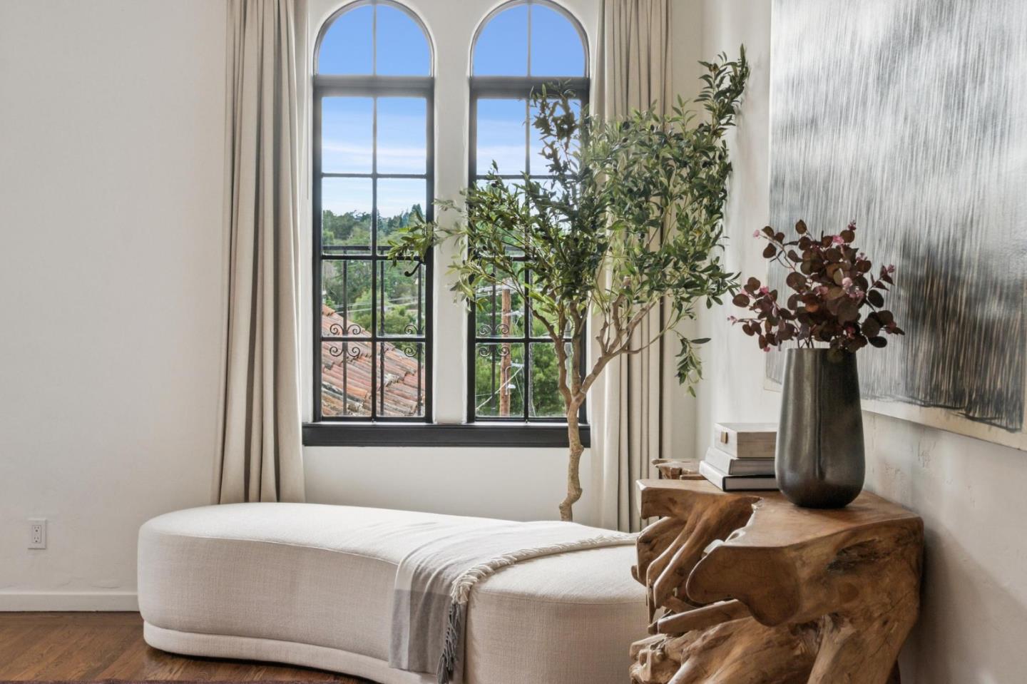 414 Edgewood Road San Mateo, CA 94402 - Photo 48 of 112 a bedroom with a bed and a potted plant