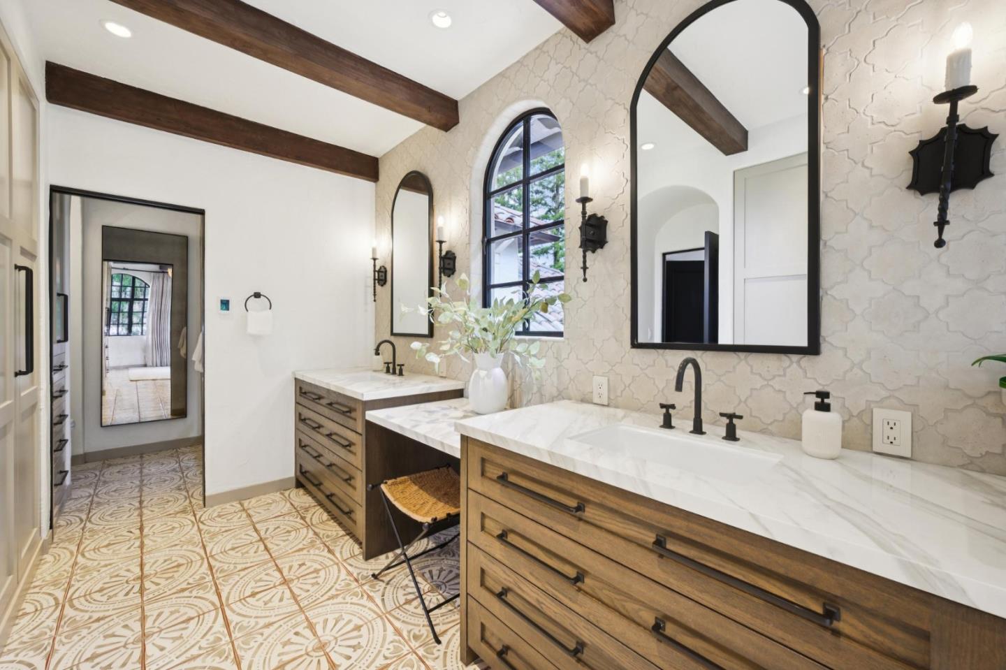 414 Edgewood Road San Mateo, CA 94402 - Photo 50 of 112 a spacious bathroom with a double vanity sink and a mirror