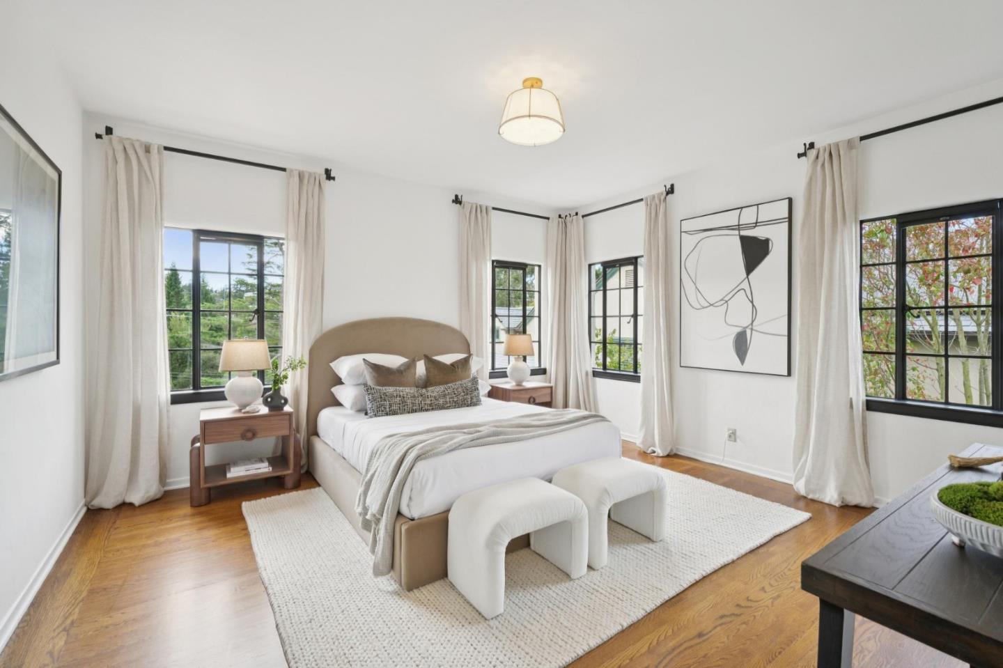 414 Edgewood Road San Mateo, CA 94402 - Photo 56 of 112 a bedroom with a large bed and a table