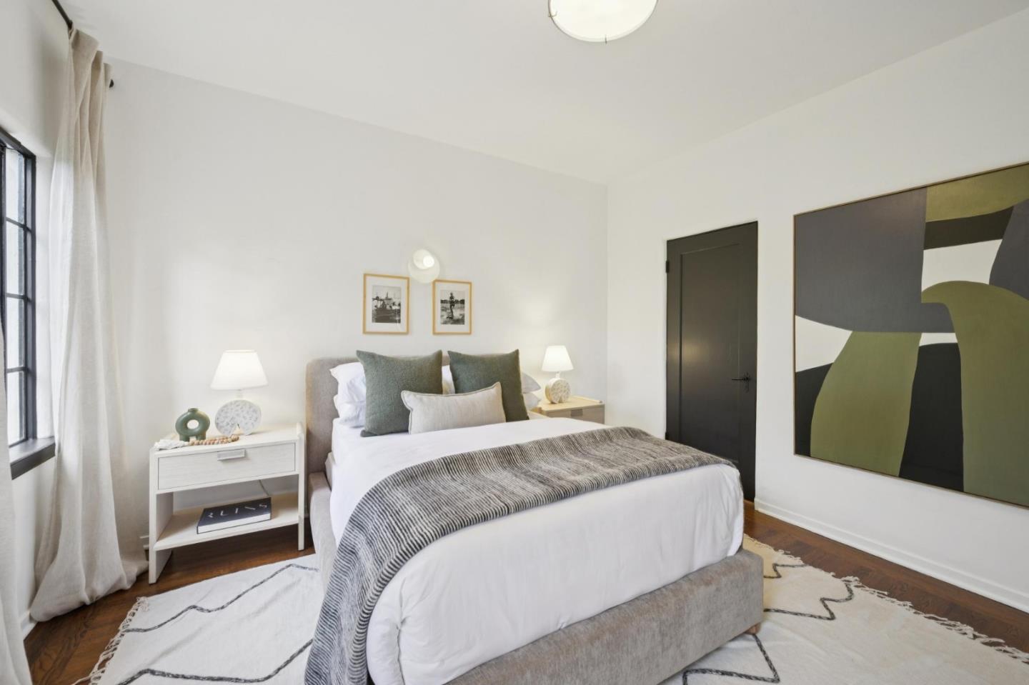 414 Edgewood Road San Mateo, CA 94402 - Photo 62 of 112 a bedroom with a bed and a large mirror