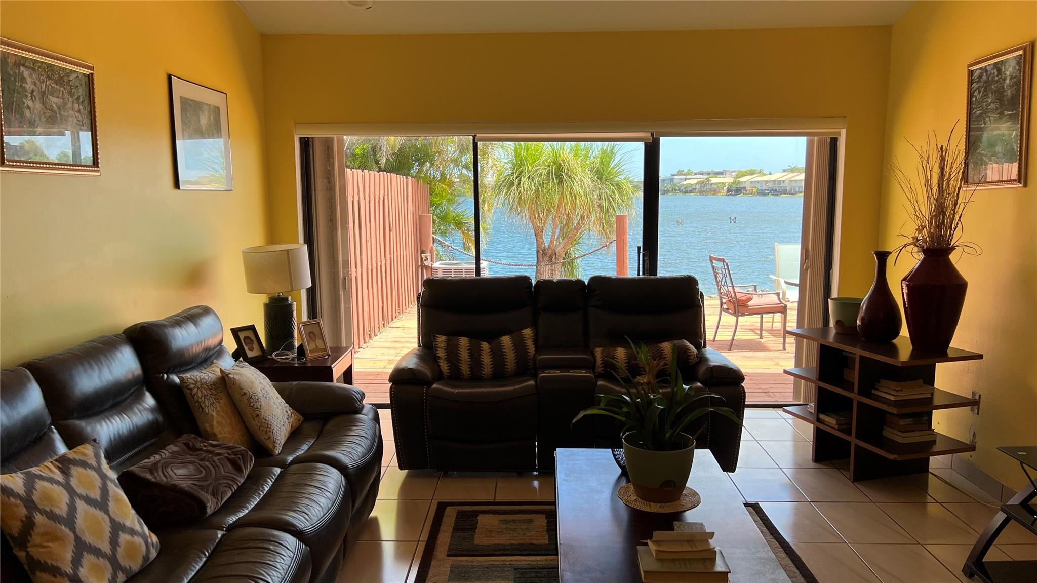 Undisclosed Address Miami, FL 33179 - Photo 12 of 15 a living room with furniture and a large window