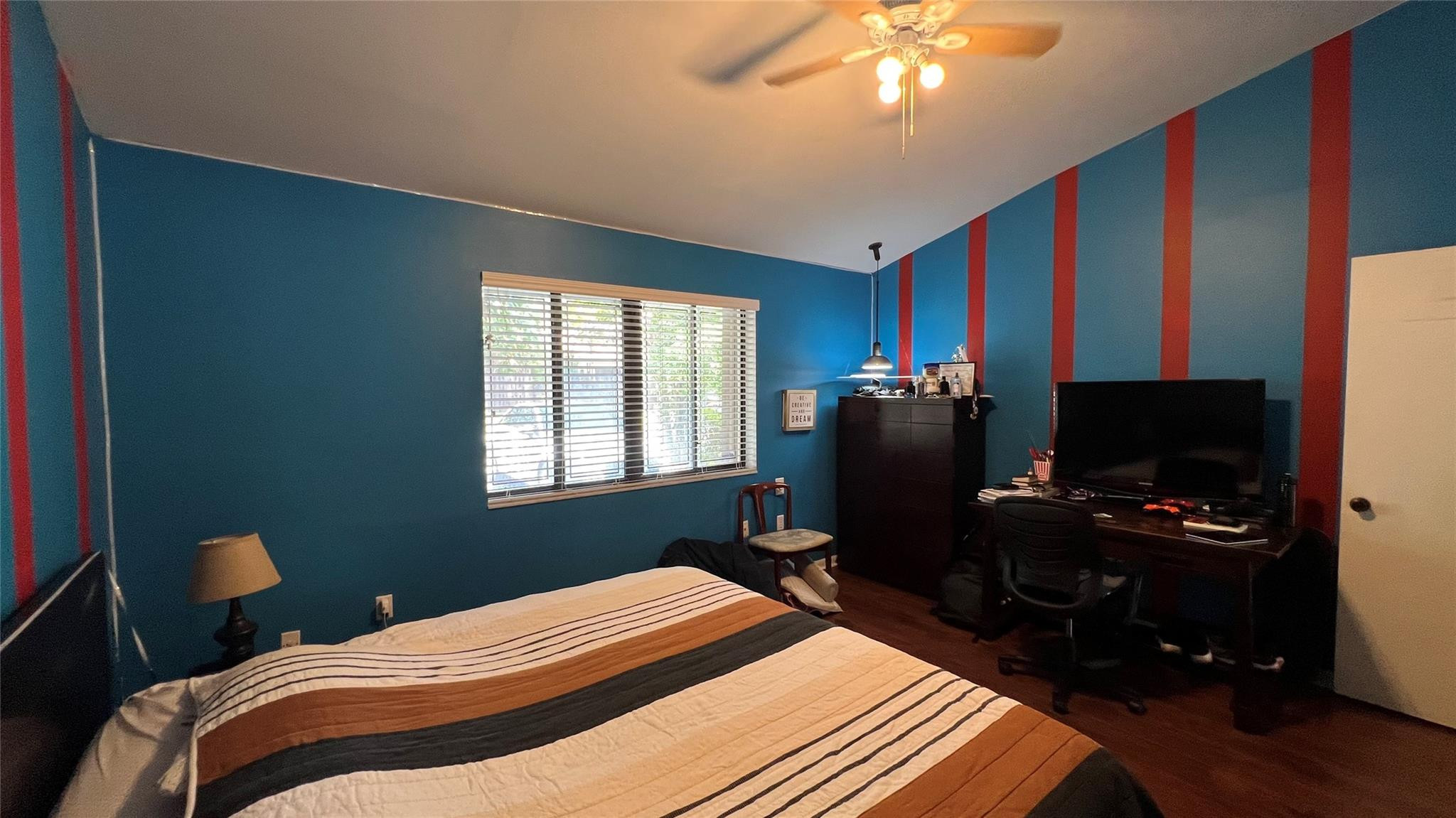 Undisclosed Address Miami, FL 33179 - Photo 14 of 15 a bedroom with bed tv and window