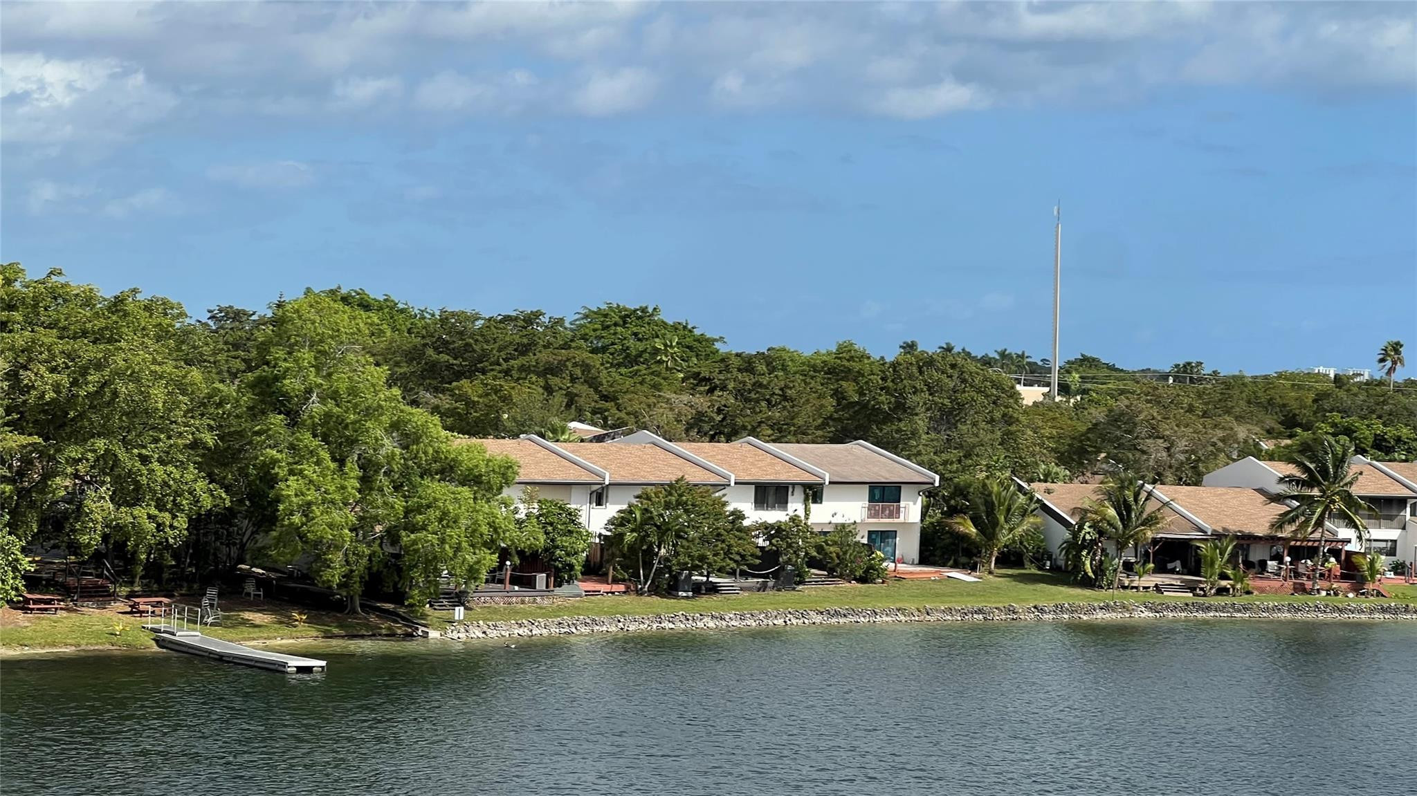Undisclosed Address Miami, FL 33179 - Photo 8 of 15 a view of a town with large trees