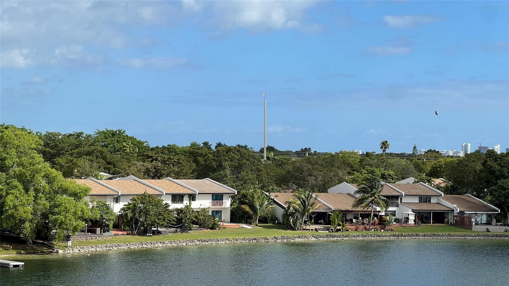Undisclosed Address Miami, FL 33179 - Photo 10 of 15 an aerial view of residential houses with outdoor space and ocean view