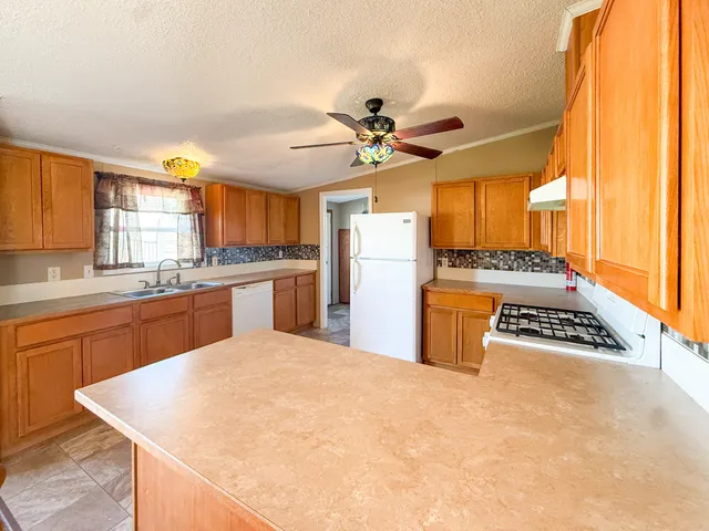 $59,000 | 704 Crockett Drive, Unit 155, Potterville, MI 48876