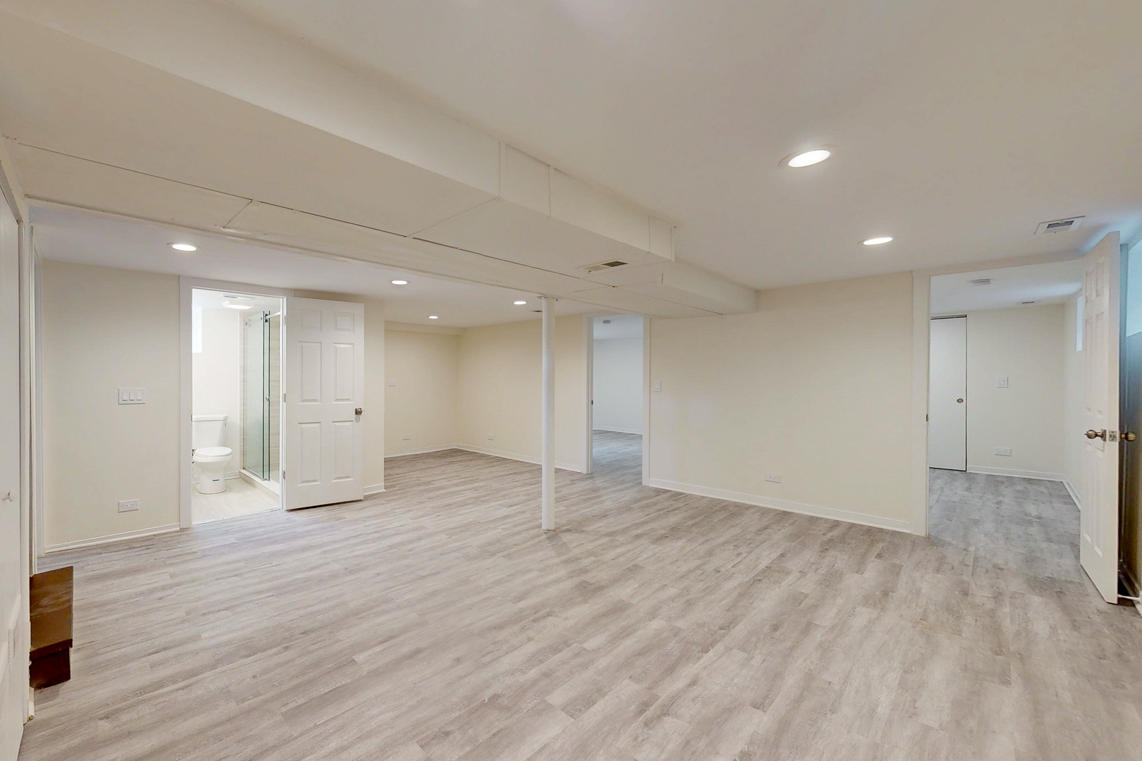 6249 West Addison Street Chicago, IL 60634 - Photo 20 of 35 a view of an empty room with wooden floor