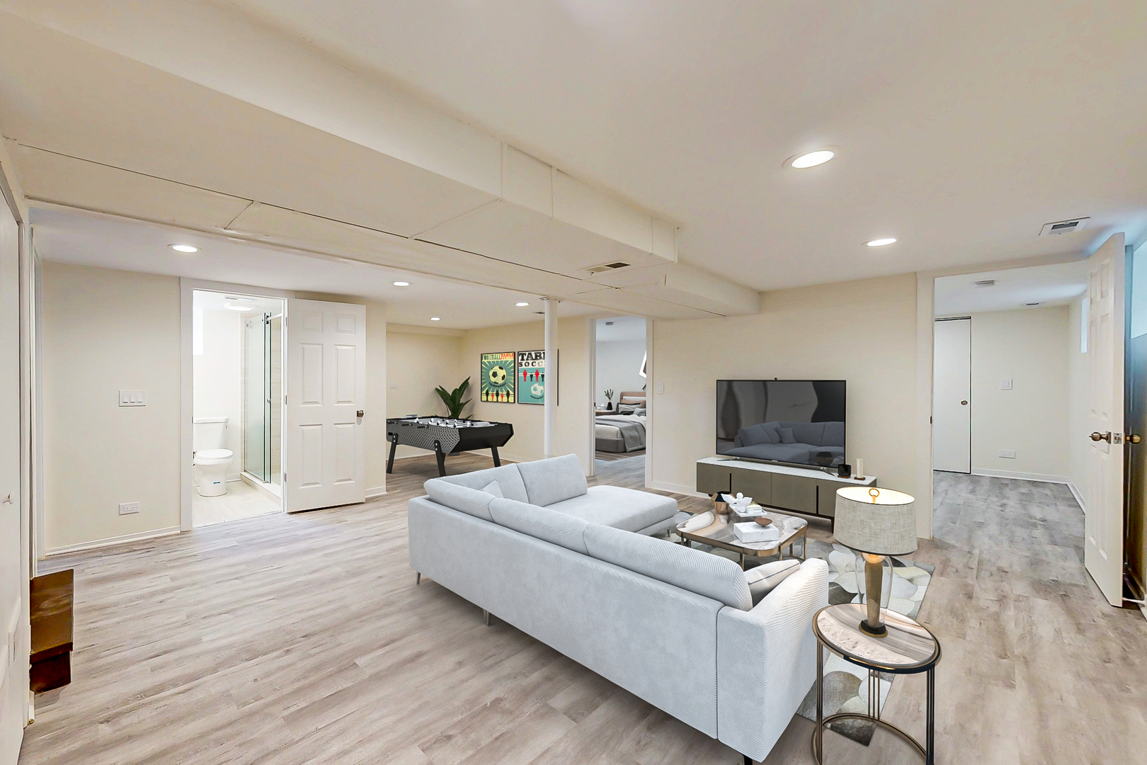 6249 West Addison Street Chicago, IL 60634 - Photo 21 of 35 a living room with furniture and a flat screen tv