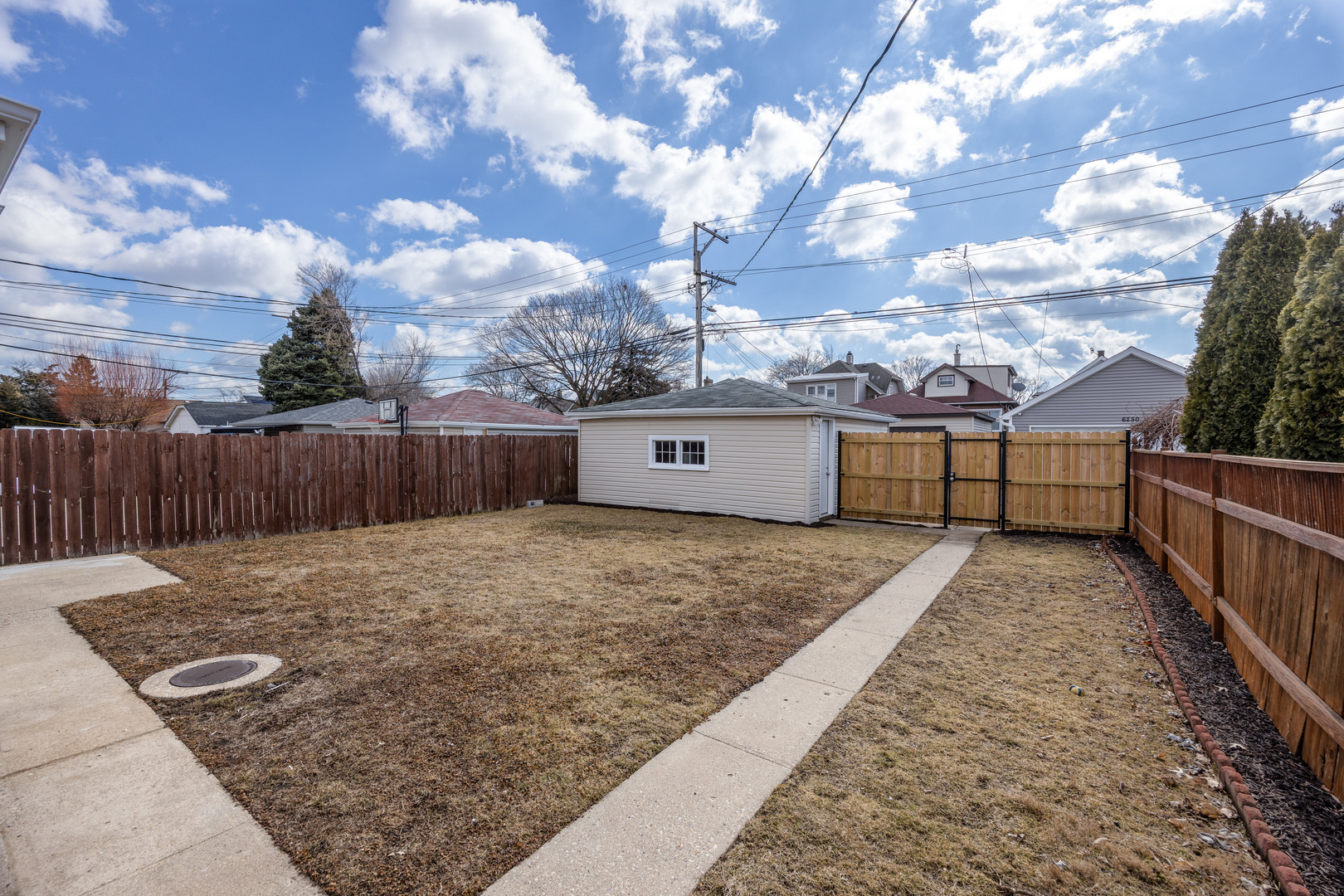 6249 West Addison Street Chicago, IL 60634 - Photo 34 of 35 a view of a backyard