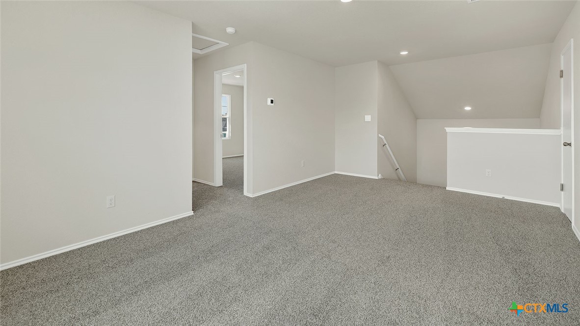 521 Hodges Street Lockhart, TX 78644 - Photo 29 of 40 a view of a big room with closet and bathroom