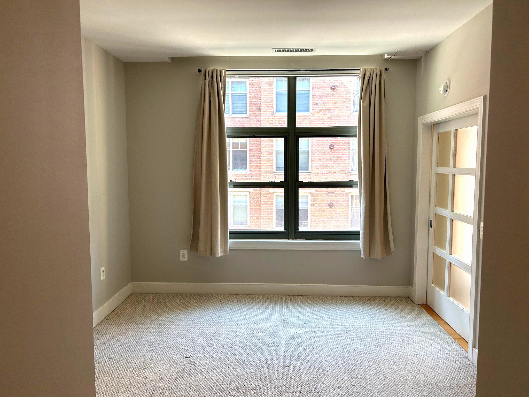 2425 L Street Northwest, Unit 421 Washington, DC 20037 - Photo 10 of 18 Bedroom with large windows