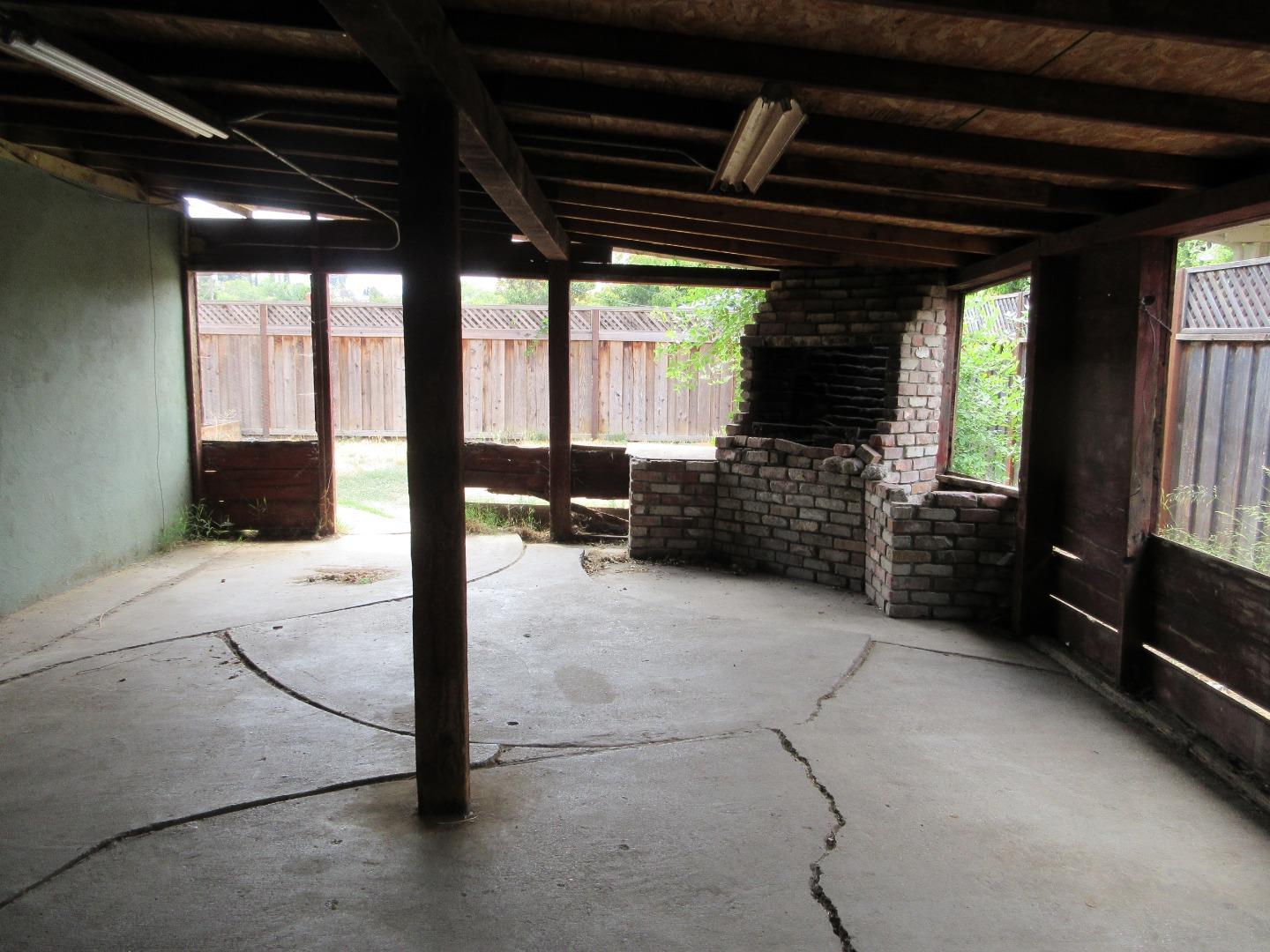696 Coyote Road San Jose, CA 95111 - Photo 15 of 18 a view of an empty room with a fireplace